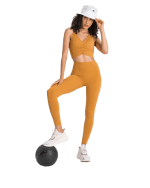 טייץ וטופ - Alo yoga set tights and top for women in orange color - Alo Yoga Set